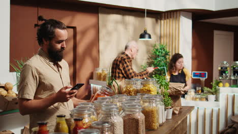 man checks online veggies are organic