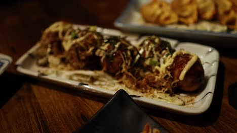 takoyaki served on a plate in bangkok restaurant