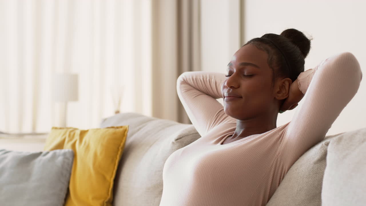 Woman Relaxing on a Sofa