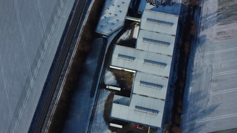 industrial complex in snowy landscape