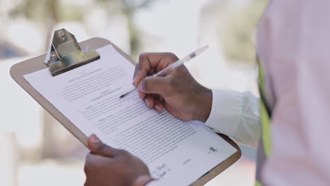 black man, hands and writing on clipboard