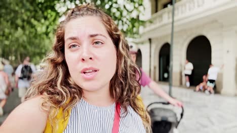 woman vlogging about her athens street experience