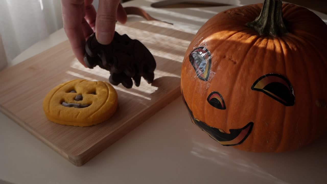 Festive Halloween pumpkin on table, warm sunlight creates cozy ambiance