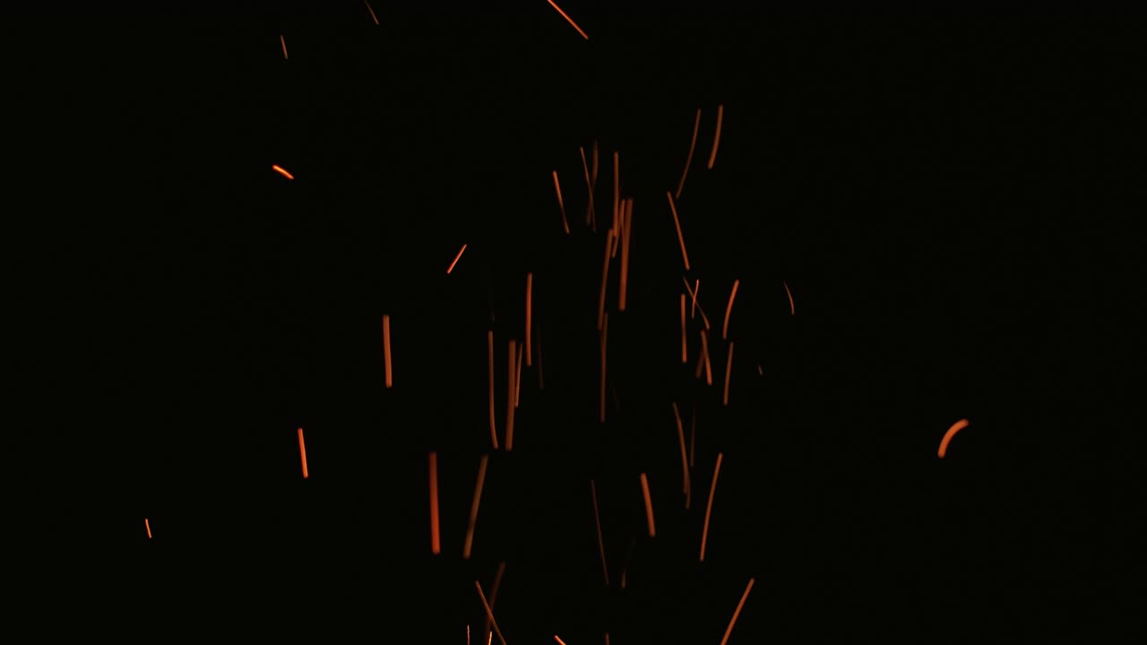 las chispas se superponen a las chispas de bronce en el brillo negro