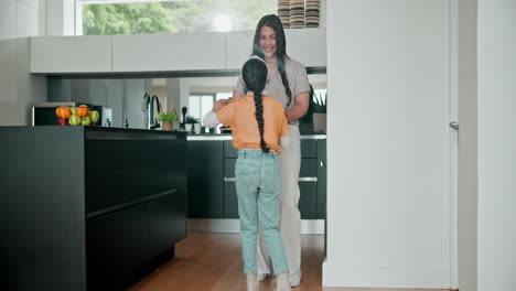 Mother,-child-and-dancing-in-the-kitchen-at-home