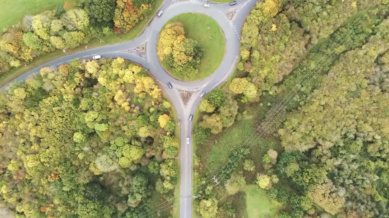High angle view directly above suburb roads junction roundabout traffic looking down