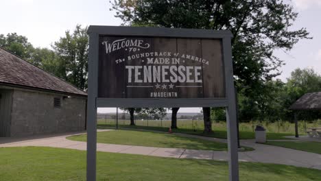 welcome to tennessee sign at welcome center with gimbal video walking forward in slow motion