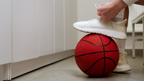 foot on basketball