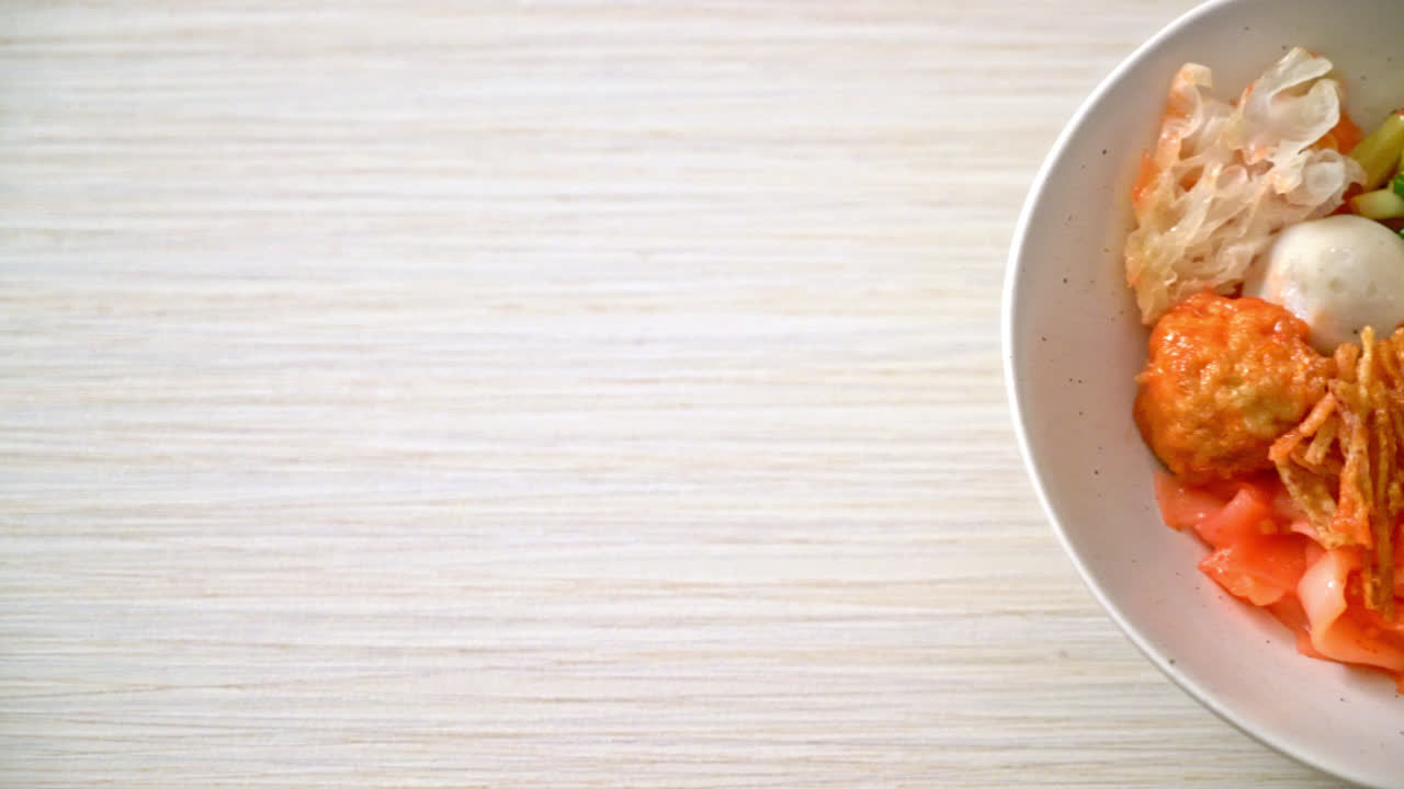 (Yen-Ta-Four) - Dry Thai Style Noodle with assorted tofu and fish ball in Red Soup - Asian food style