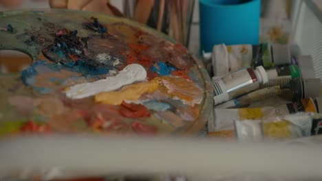 artist's palette and paint supplies
