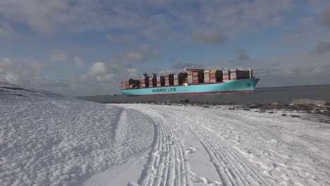 maersk line container ship in snowy waters