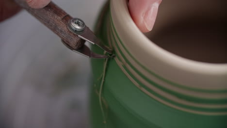 close-up of pottery making process