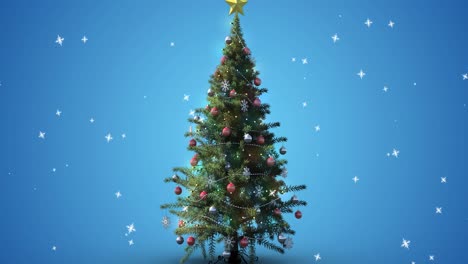 animación de nieve cayendo sobre el árbol de navidad sobre un fondo azul