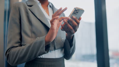 businesswoman using smartphone in office