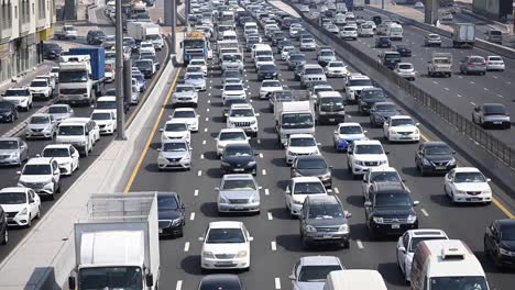 slow-moving traffic on sheikh mohamed bin zayed road heading towards dubai from sharjah national paints in the uae