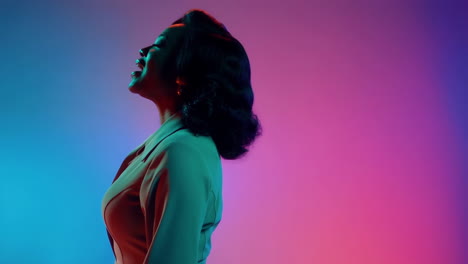 artistic profile portrait of a woman in vibrant neon lights