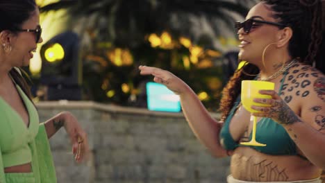 Women Enjoying a Poolside Party