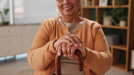 senior woman with walking cane at home