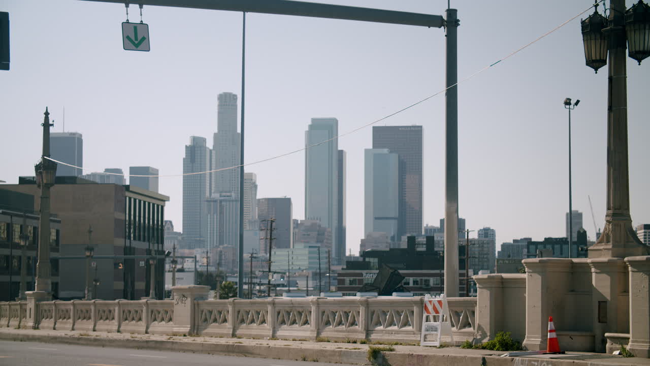 Empty City Bridge with Urban Skyline Background