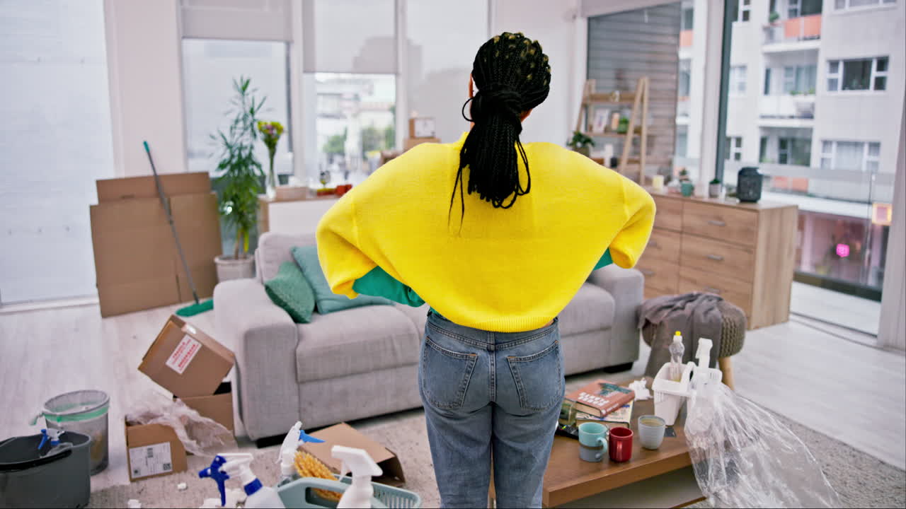 Cleaning, woman and back with messy living room