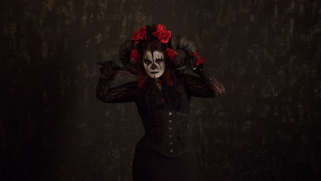 catrina cosplay girl moving slowly, dancing with her hands posing on her right side profile in dark background, medium shot
