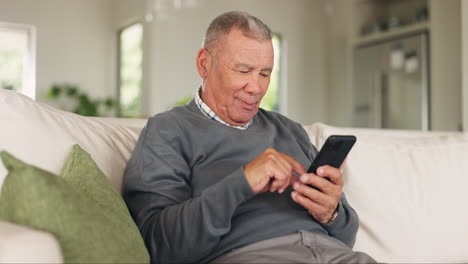 Relax,-phone-and-search-with-old-man-on-sofa