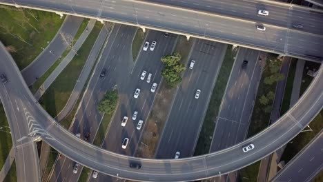 Top-down-angle-aerial-drone-view-of-elevated-road-and-traffic-junctions-in-Chinese-metropolis-city-Chengdu-during-sunny-day