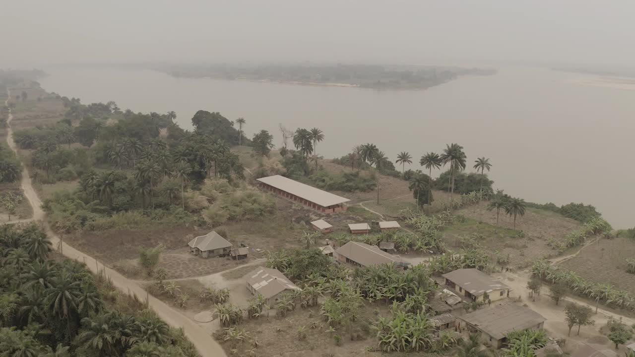 Coastal community aerial shot bordered by River Niger