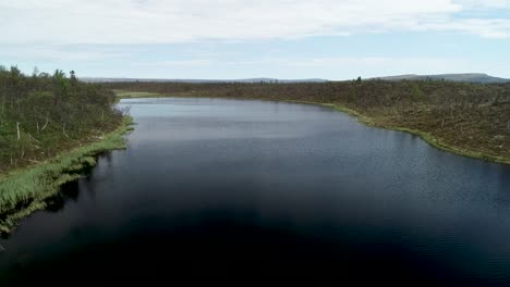 scenic flight over a lake in the mountains