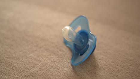 close up dolly shot of a pacifier