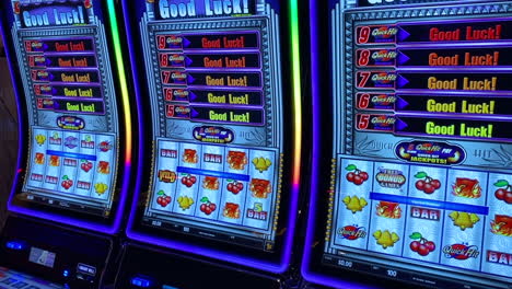 colorful lights on slot machines with good luck message on cruise ship casino