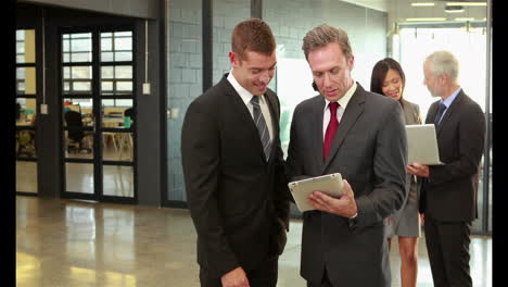 business people using tablet and laptop