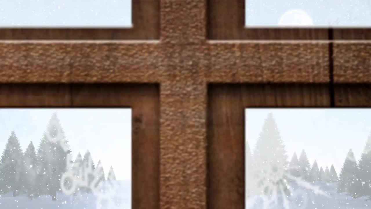 산타클로스의 검은 실루 ⁇  위에 내리는 눈에 맞춰 나무 창문 프레임의 디지털 애니메이션