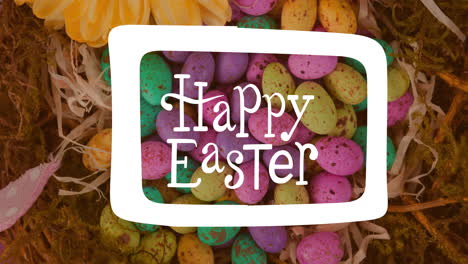 animation of happy easter text over multi coloured easter eggs in straw