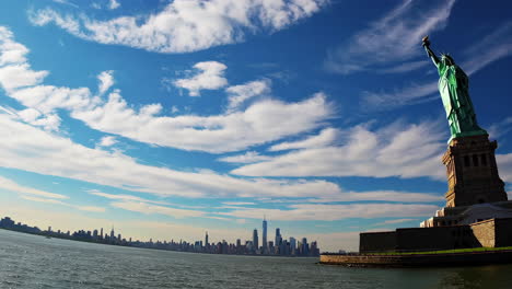statue of liberty with new york city skyline