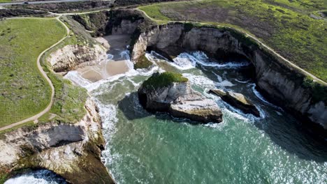 Dramatic Ocean Cliffs on the West Coast with Waves Crashing Against Rocks