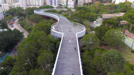 cyclists at hong kong po kong elevated cycling track park, aerial view