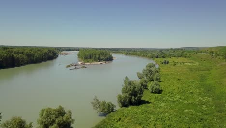 Aerial-Flying-over-the-mountain-river-View-of-the-islands-and-the-forest