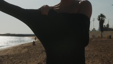 surfer man walking to the beach at sunset preparing for surfing training and search for waves in barcelona, spain, water, ocean exercise in sea with board, athletic male holiday or travel in vacation