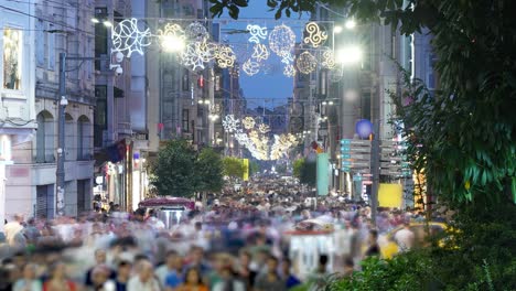 Street-with-crowd-of-people-at-night,-Istiklal-Street-Istanbul.