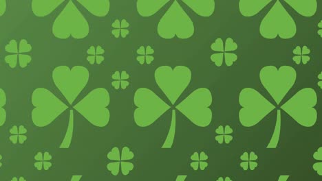 Animation-of-multiple-clover-leaves-moving-in-formation-on-green-background