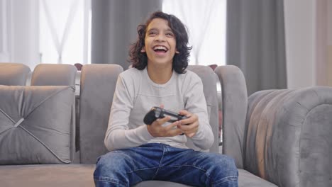 Indian-teenage-boy-wins-a-video-game-match