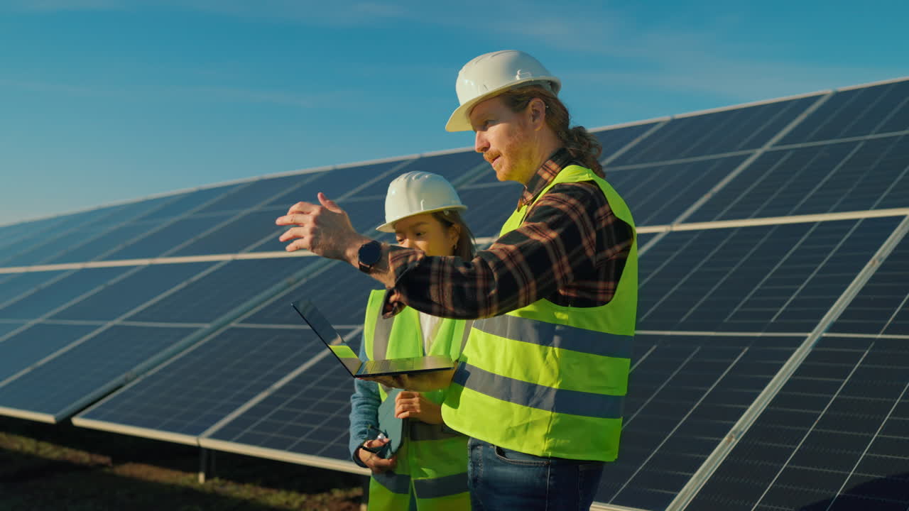 Engineers Inspecting Solar Panels