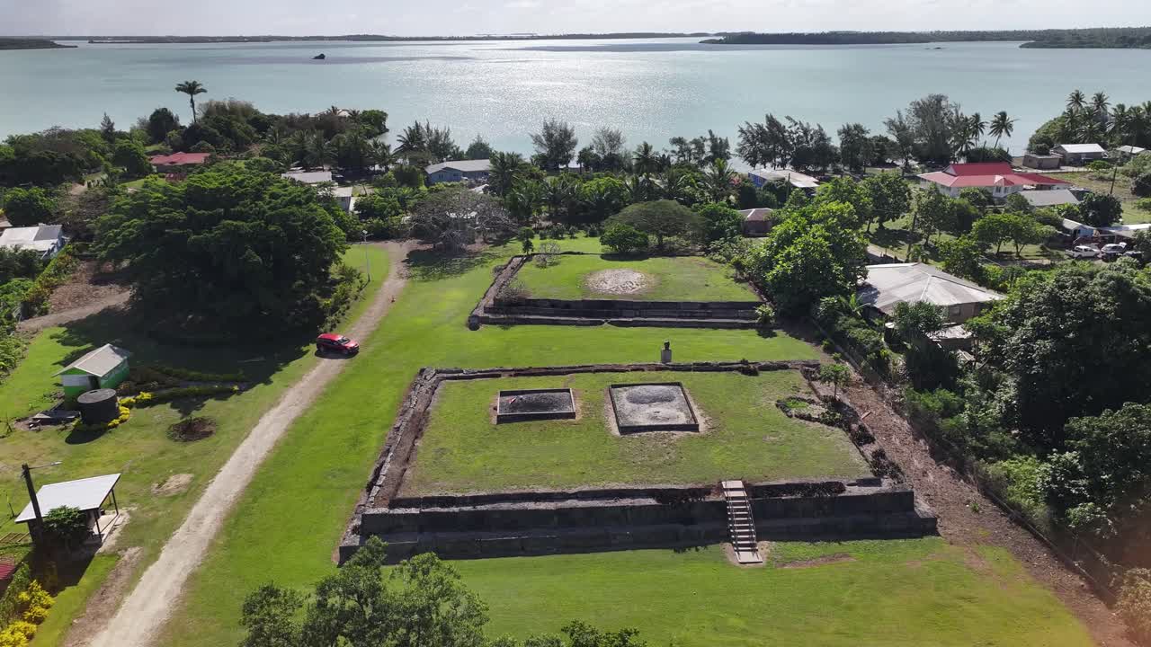 Aerial view of ancient royal tombs on Tonga shoreline. Terrace megalithic monuments. Pacific Islands.