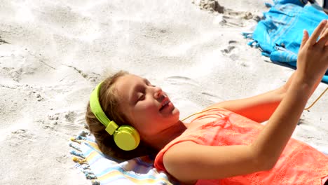 girl taking selfie with mobile phone in the beach 4k