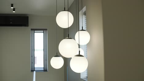 modern pendant lights with spherical glass shades