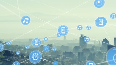 animation of network of digital icons against aerial view of cityscape