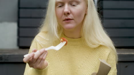 woman enjoying her food