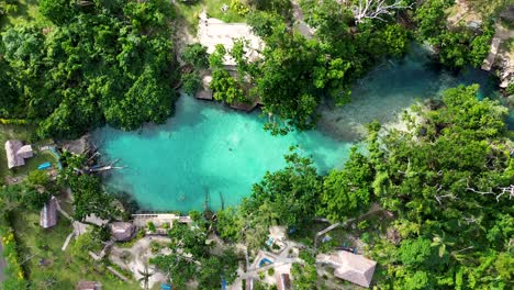 drone aerial landscape view blue lagoon swimming hole tourism travel eton village jungle rainforest river tropical port vila efate vanuatu pacific islands 4k