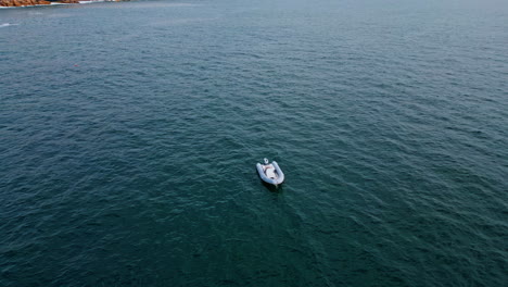 inflatable boat endless water seascape close up. rubber raft cruising deep ocean